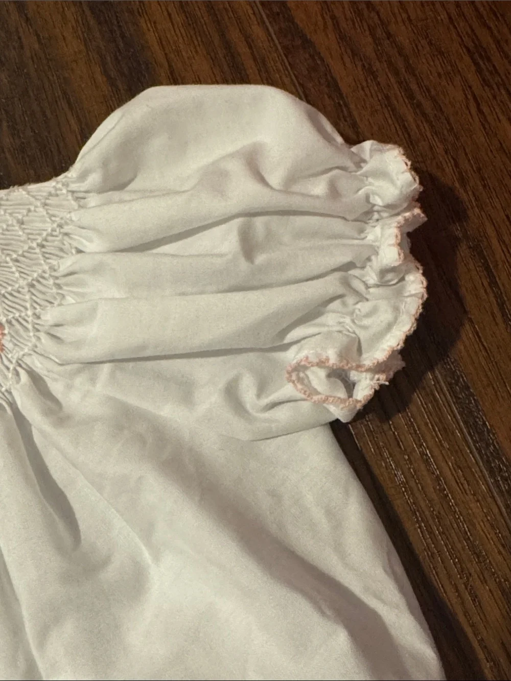 White Baby Bubble with Pink Smocked Crosses
